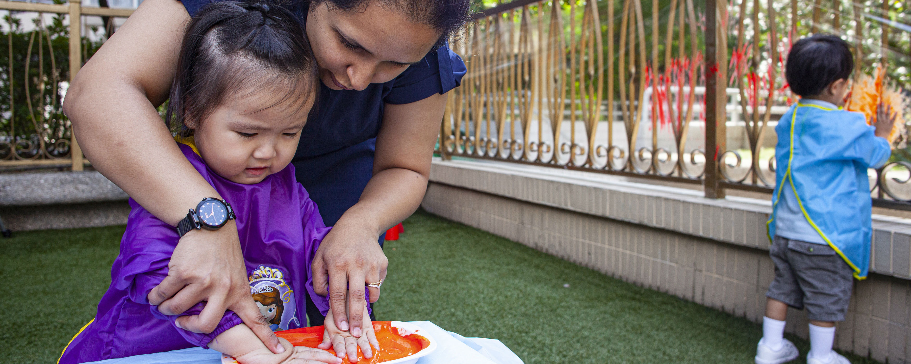 Kindergarten playgroup hand painting